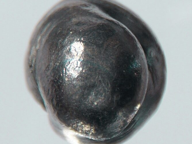 Close-up of a raw beryllium mineral specimen